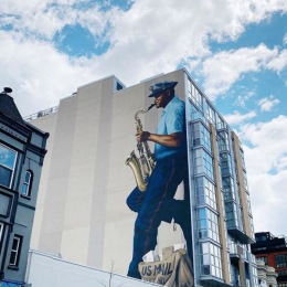 One of our favorite murals on 14th street by @joepagac honoring Buck Hill, a lifelong Washingtonian, jazz musician, and mail carrier. Instagram post from @the_ellingtondc on May 12, 2020 07:59:50am